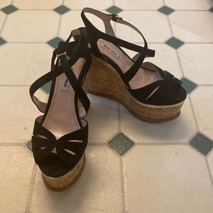 Black suede platform wedges. Gorgeous with jeans or a cute skirt.